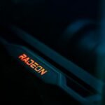 Detailed view of a glowing Radeon graphics card highlighting its hardware design.