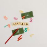 Creative flat lay of scam concept with play money and numbers.